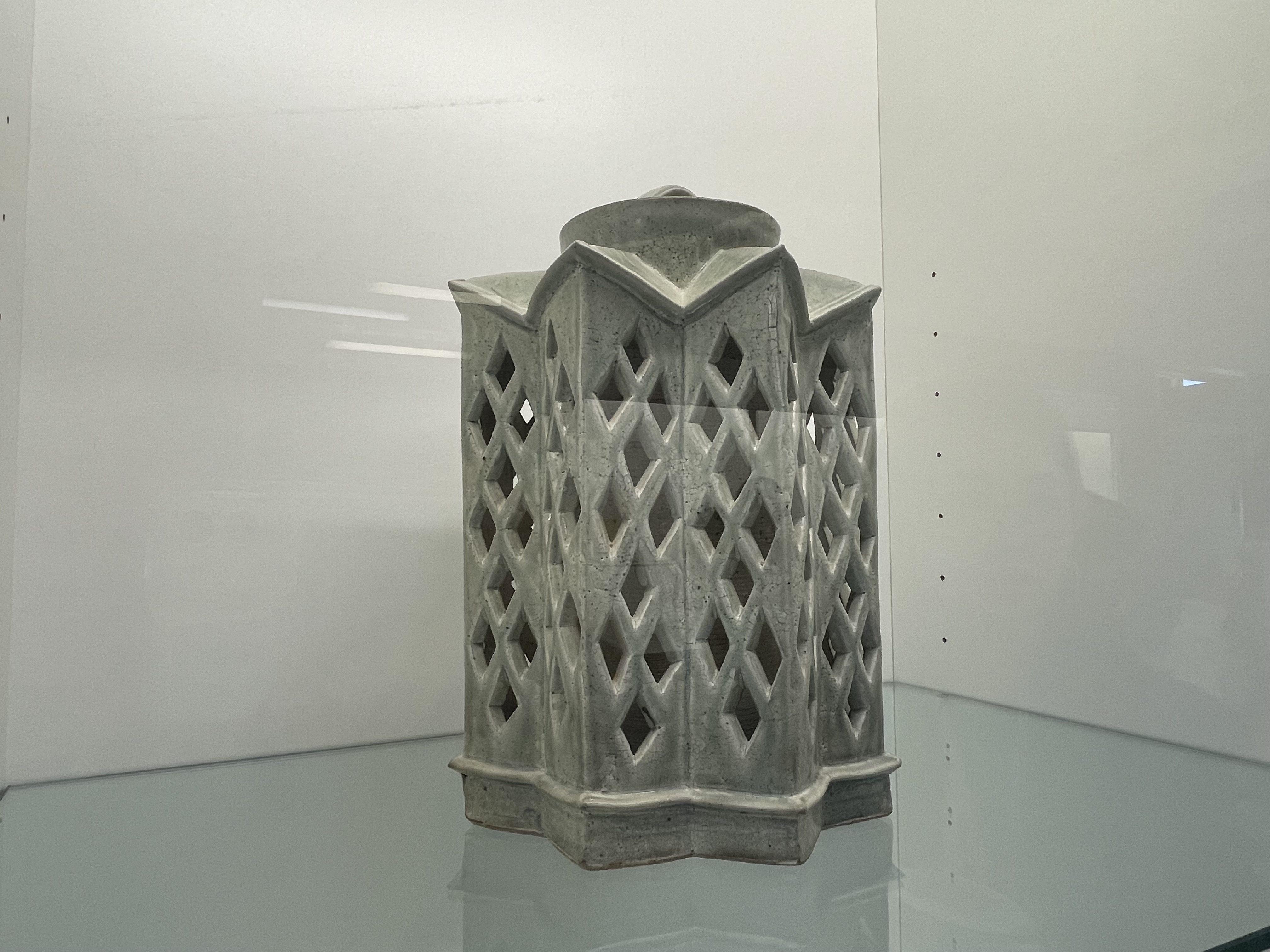 This pottery piece was on display from the ceramics Crafts & Design Program. The materials are clay and a coloured glaze.