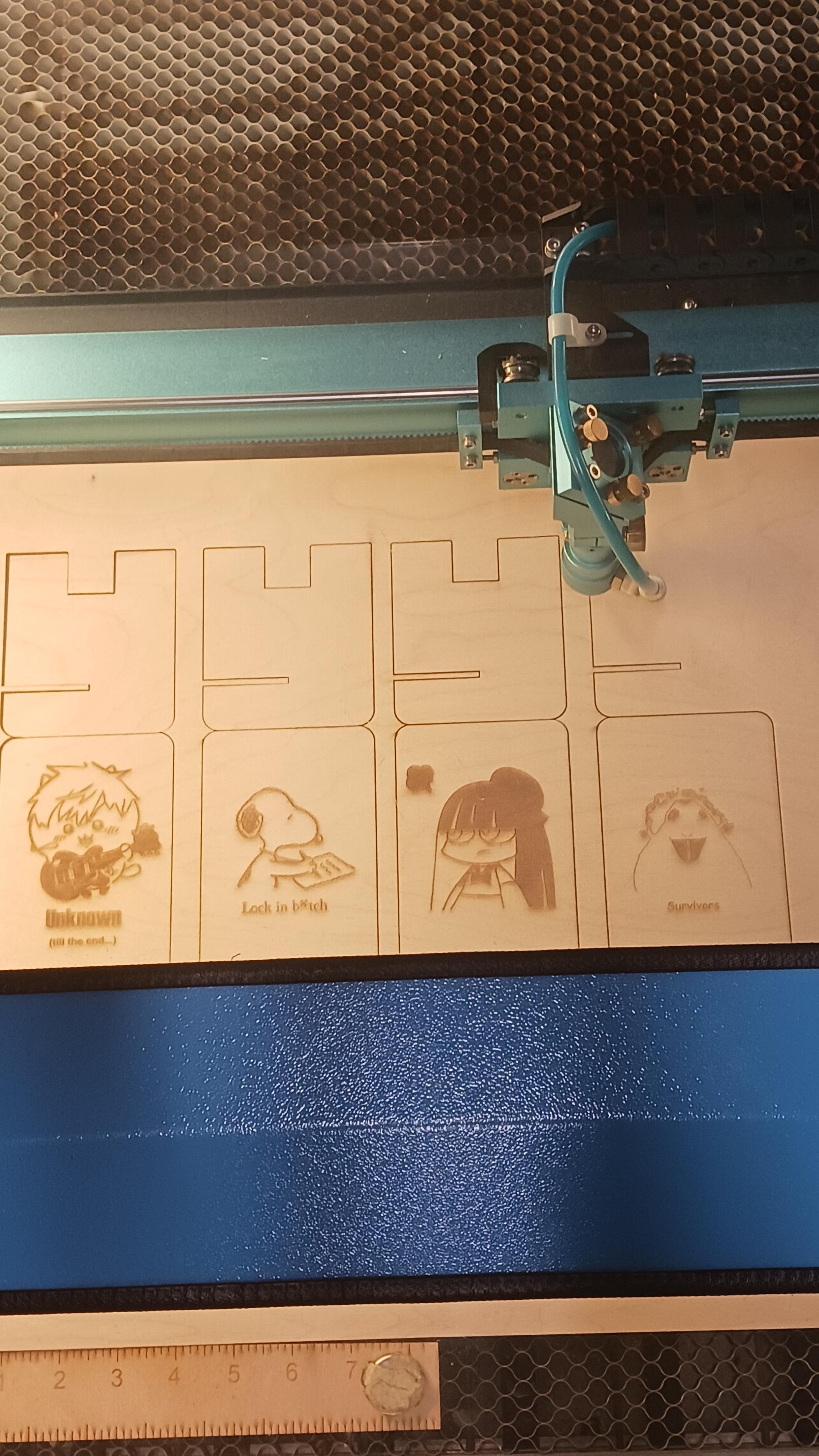 Once the machine finalized the designs on the phone stand, it began cutting out the shapes as a final step.