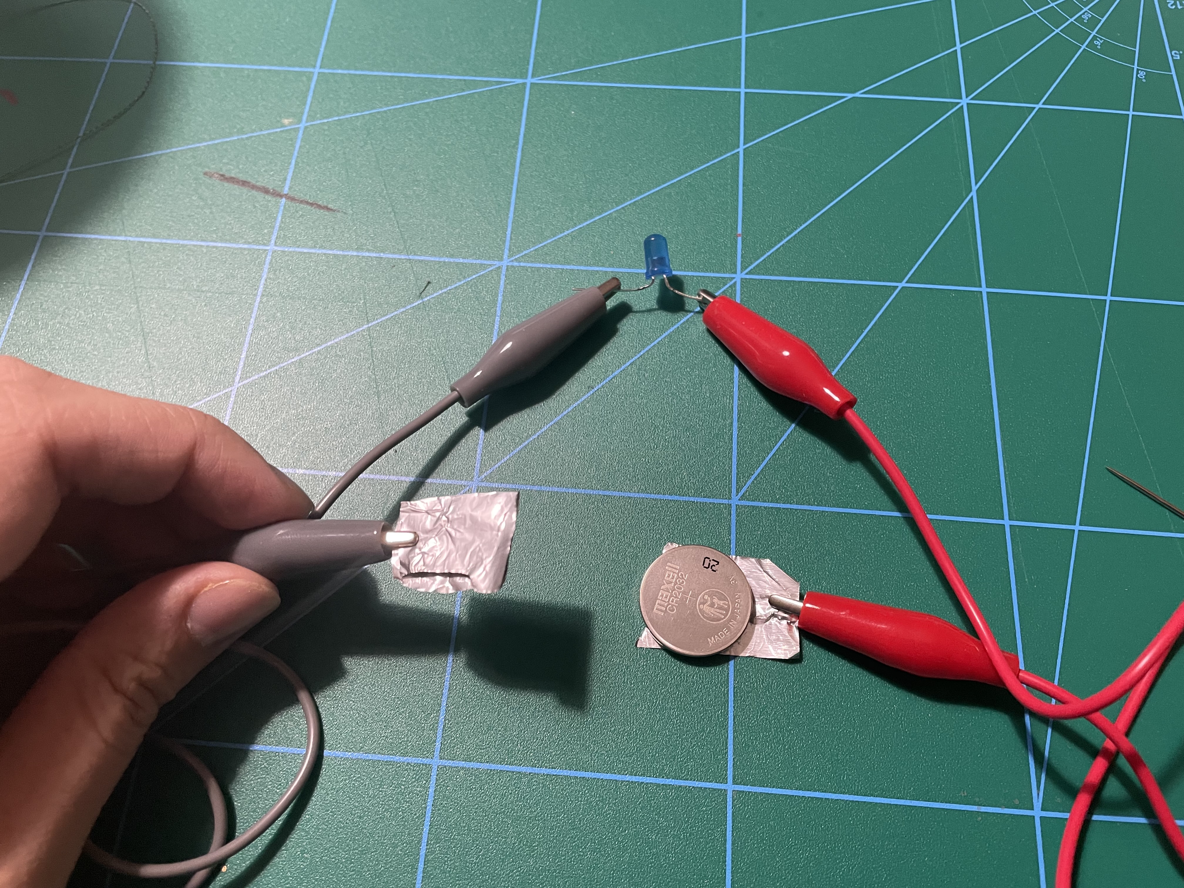 This isn't a paper or fabric circuit, but I thought to experiment with the aligator clips and aluminium foil with the light.