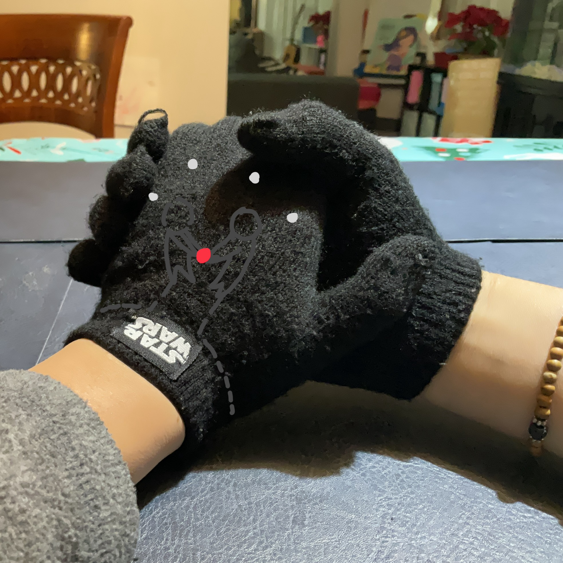 If I were to lean into touching the gloves together to complete the circuit, there would be room for integrading an interesting design too.