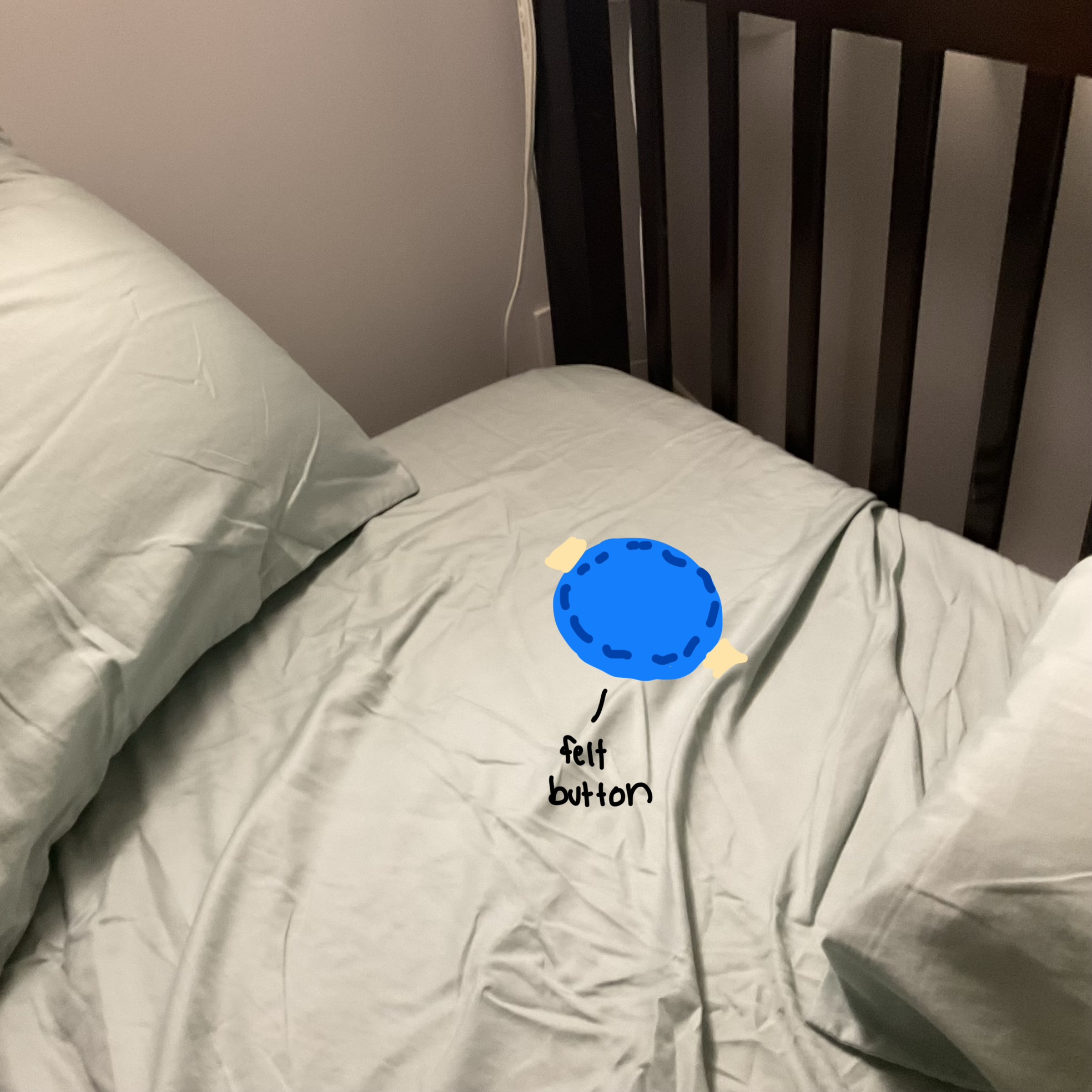 Underneath the pillow is a fabric button that activates depending on the pressure put on it. Laying down will essentially power the circuit.