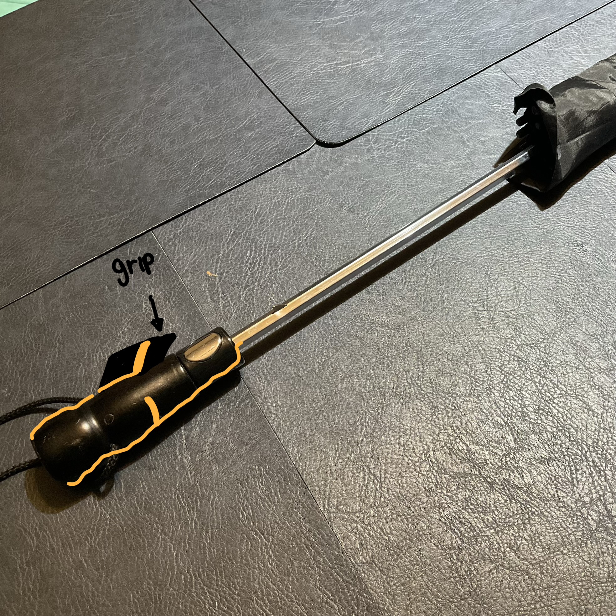 Further visualization of the circuit work from the handle to the metallic (and conductable) parts of the umbrella.