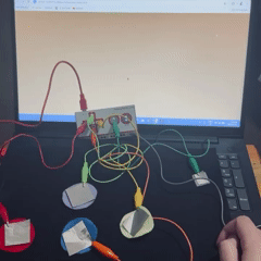 I used felt and conductive fabric to create an open button system. By holding the ground wire, I created open fabric buttons to trigger sounds when touched.