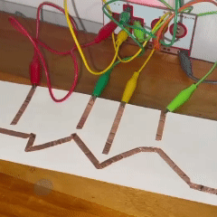 I used copper tape to map out a maze circuit. I thought it would be interesting to have open circuits placed on the journey of a coin, so when it passes the area it creates a sound to represent a milestone.