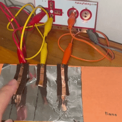 I continued working with aluminium foil, felt, and copper tape to create a piano visual. When I press down on the black keys, it creates a sound when it touches the aluminium acting as the ground.